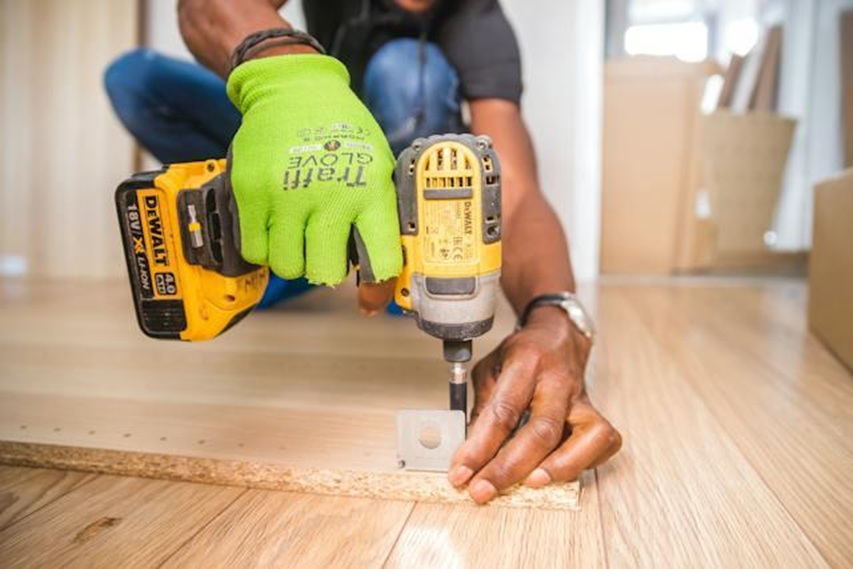 a man drilling
